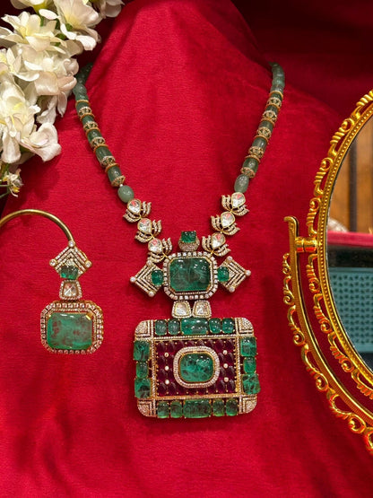 The Royals Charm Emrald Moissanite Necklace.