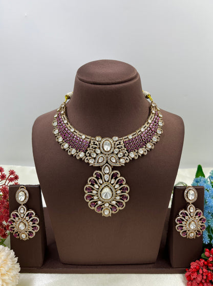 Ornate necklace set on a brown mannequin with flowers in the background